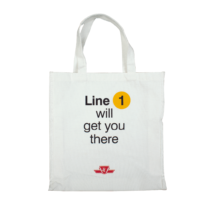 White custom tote bag with TTC logo and tagline, "Line 1 will get you there"