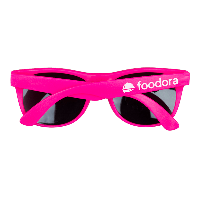 Pink promotional sunglasses with white Foodora logo on the right arm
